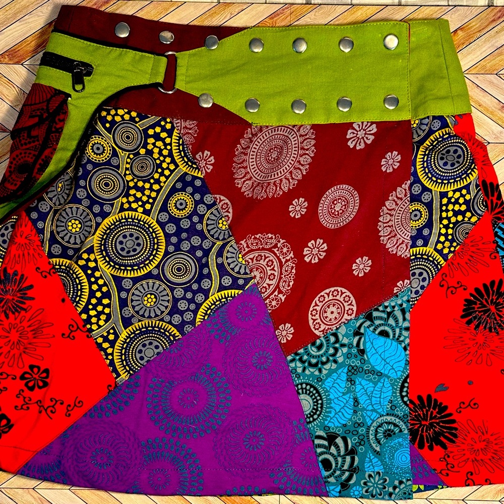 Imported Tibetan mini-skirt with side pocket. Adjustable size 6-8